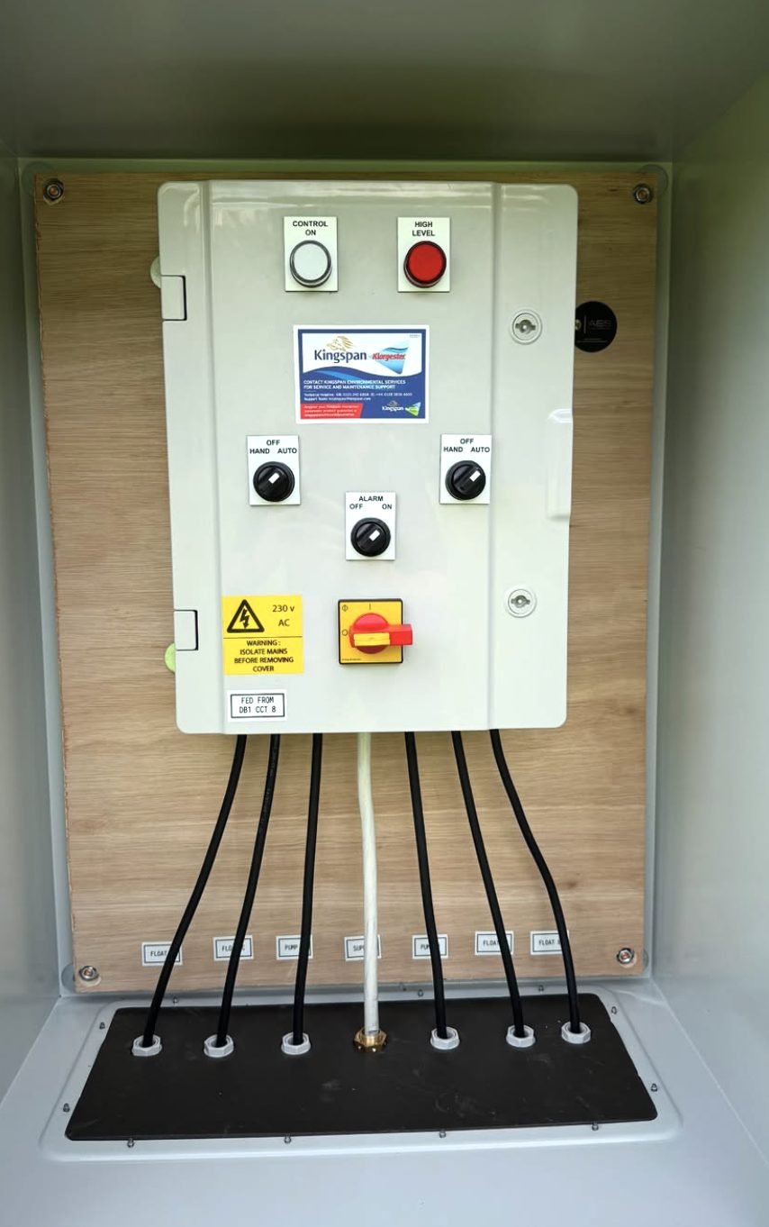 Pump control panel wired and labelled inside an enclosure